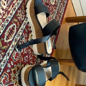 Steve Madden platform sandals. Slightly worn.